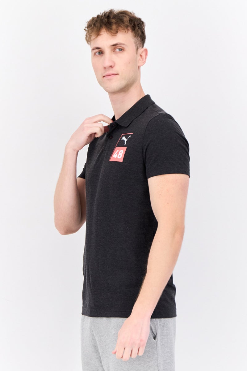 PUMA قميص بولو خارجي للرجال بقصة ضيقة بأكمام قصيرة، أسود - Image 2